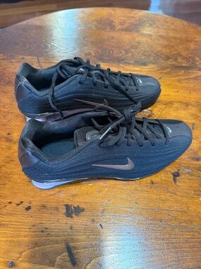 Nike Women’s Chocolate Brown Running Sneakers with Subtle Pink Accent